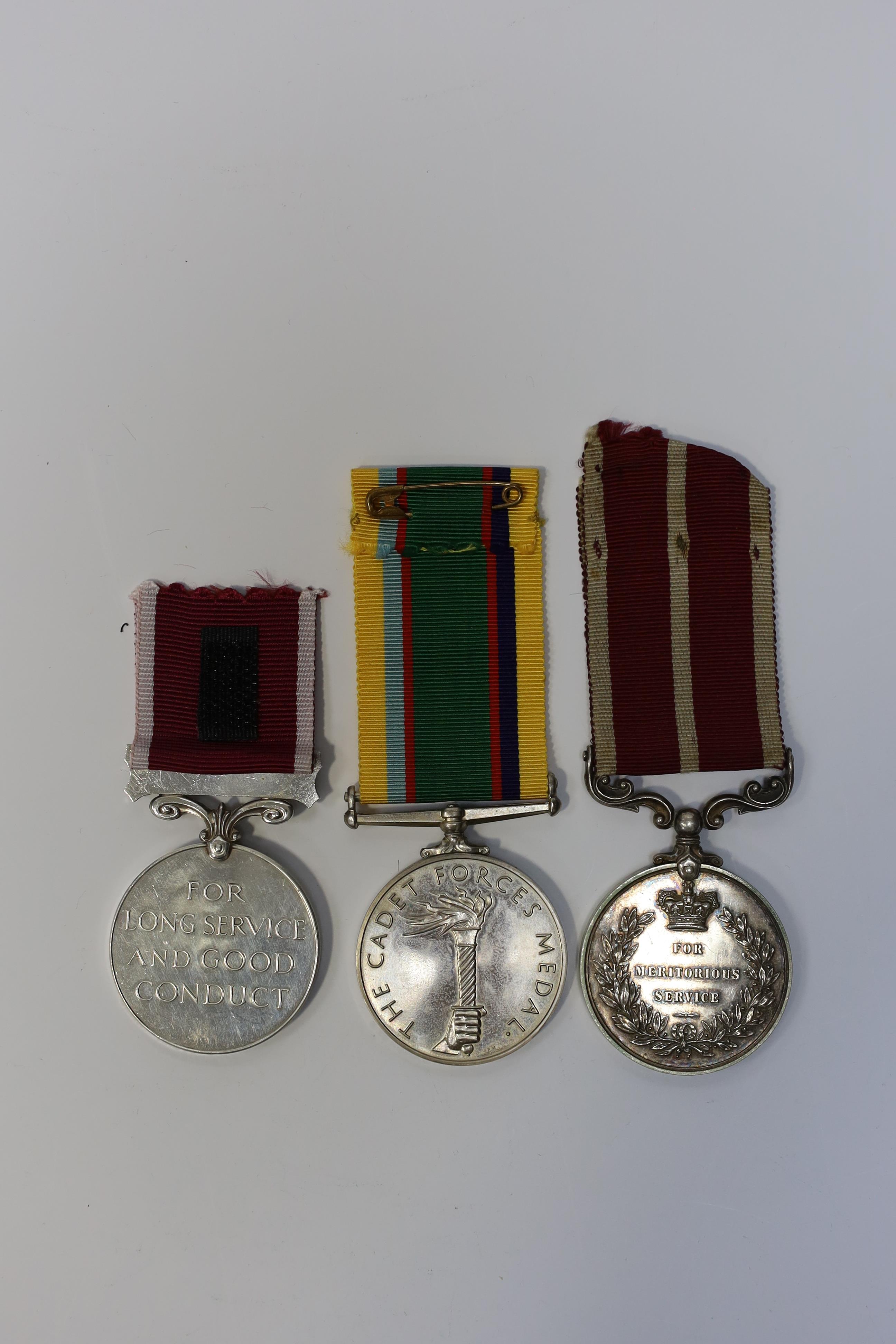 Three assorted service medals; GVI (D) Army Meritorious Service medal to Sjt A.Matheson.R.A.; ERII (A) Army LSGC to 23948816 Sgt M O Digan RAMC; ERII (A) Cadet Forces medal to Sqn.Ldr.J.R.Allen RAFVR(T). Condition - fair